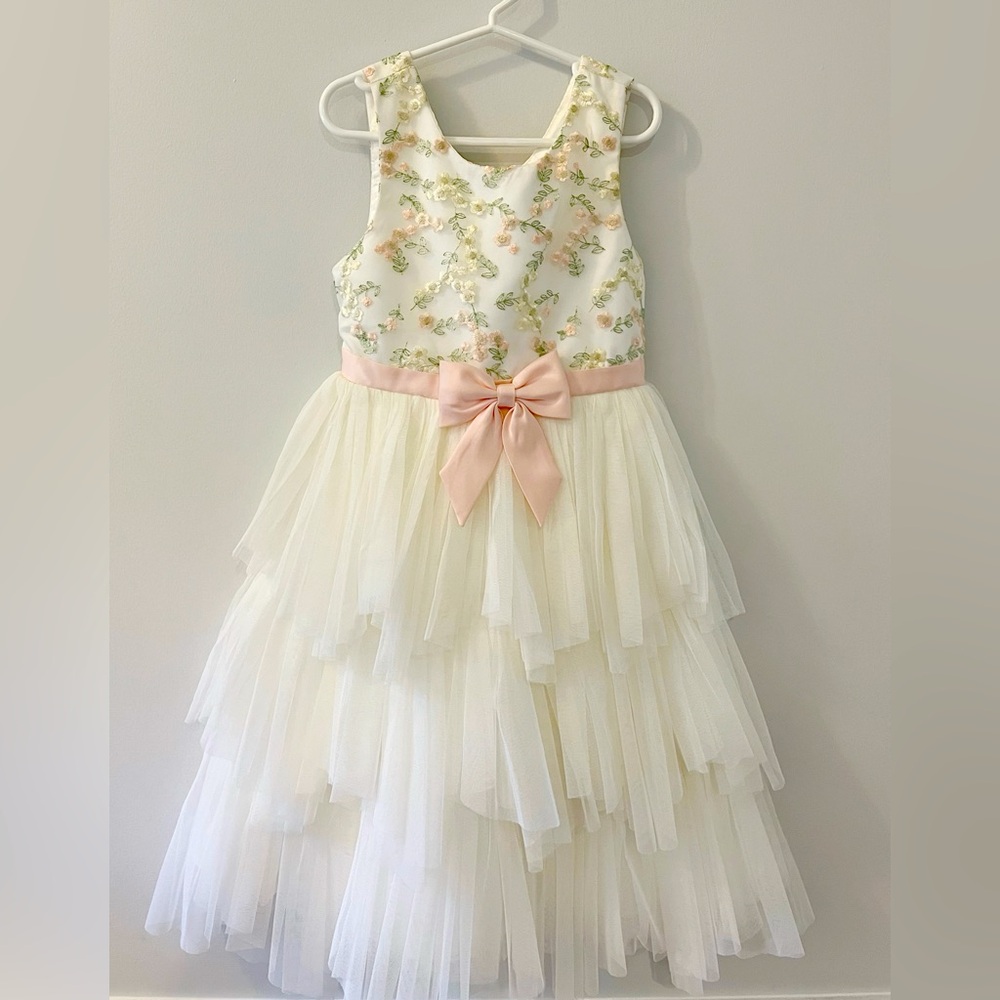 Child dress with floral bodice, fully lined with hidden zipper in the back.